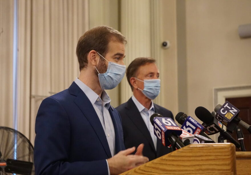 The masks stayed on Friday when Hartford Mayor Luke Bronin and Gov. Ned Lamont got to the microphone.
