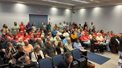 A full room watches deliberations by the Roanoke Board of Zoning Appeals as it considers the city's case against The Least of These Ministries.