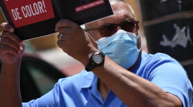 Democratic gubernatorial candidate Dr. Woody Myers wears a face mask during a union-organized rally in support of the Black Lives Matter movement.