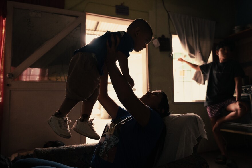 Roynerliz Rodriguez, 31, plays with her son Jared Ramos Rodriguez, 1, in their home in El Tocuyo, Venezuela.