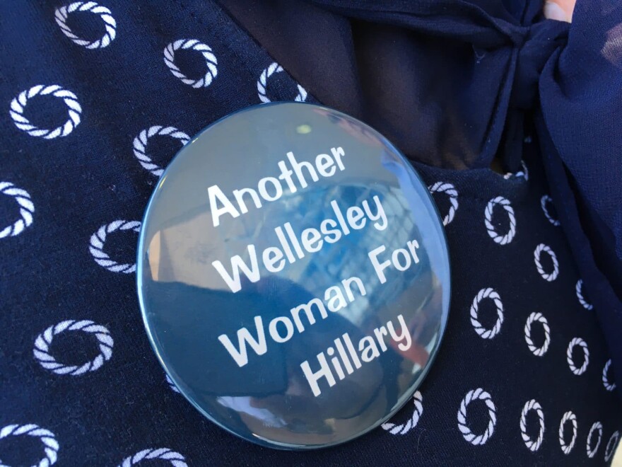 A "Another Wellesley Woman For Hillary" button, pinned to Suzanne Salomon's shirt. Salomon was Clinton's suitemate at the college for three years. (Samantha Fields/Here & Now)