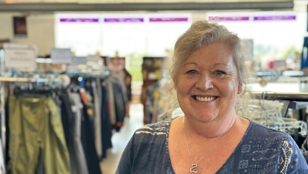 Carol Rose stands inside the WRC Thrift Store on U.S. 31 in Garfield Township. She's worked there for 40 years and is being honored by WRC for her many years of service. (Photo: Ed Ronco / IPR News)