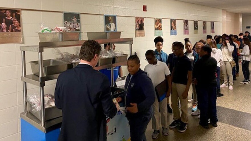 Students line up to grab a free breakfast at the School City of Hammond.