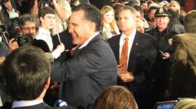 Romney signs autographs after his Peterborough event with McCain