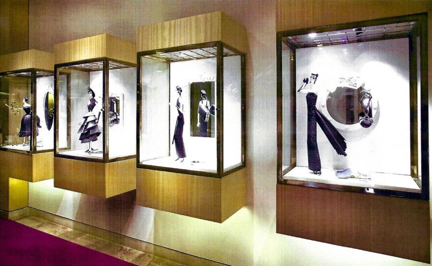 Reproductions of Neiman Marcus ads from 1948 in paper sculpture, 2007.