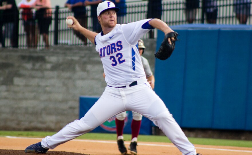 Florida pitcher Logan Shore throws the ball in the first inning of the Gainesville Super Regional against Florida State University on June 5.