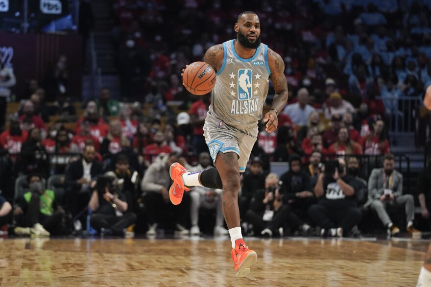 Los Angeles Lakers' LeBron James drives down the court during the second half of the NBA All-Star basketball game on Sunday in Cleveland.