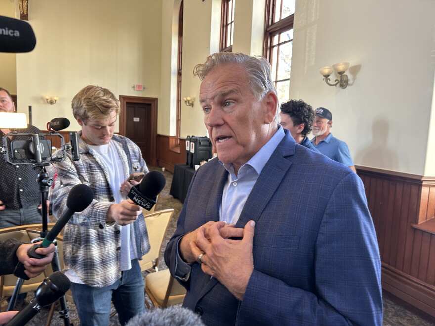 Former congressman Mike Rogers, Republican candidate for Michigan's open U.S Senate seat, takes questions from the press at a business event in Traverse City on Friday, Oct. 23, 2026