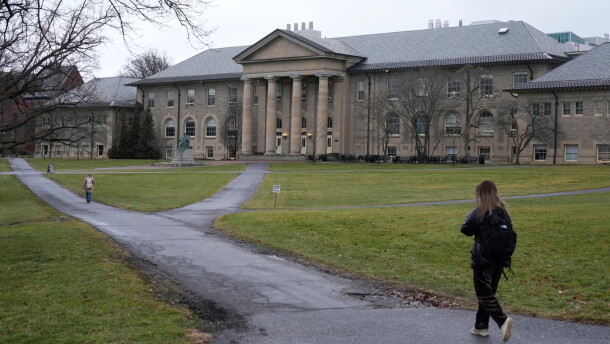 People walk on the campus of Cornell University in Ithaca, N.Y., in 2024.