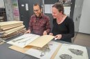 Botany professors Jim Cohen and Heather Root leaf through plant specimens in their Weber State University lab in Ogden, March 10, 2026.