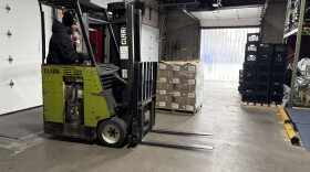 40,000 pounds of spare ribs being unloaded at the Great Plains Food Bank.