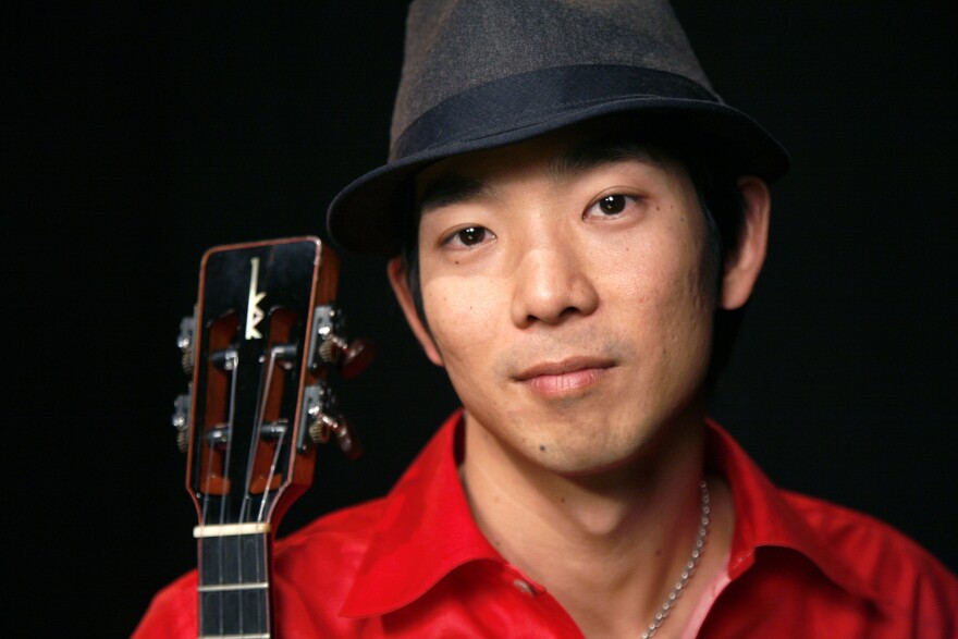 Ukulele player Jake Shimabukuro poses for a portrait Monday, Jan. 24, 2011 in New York.