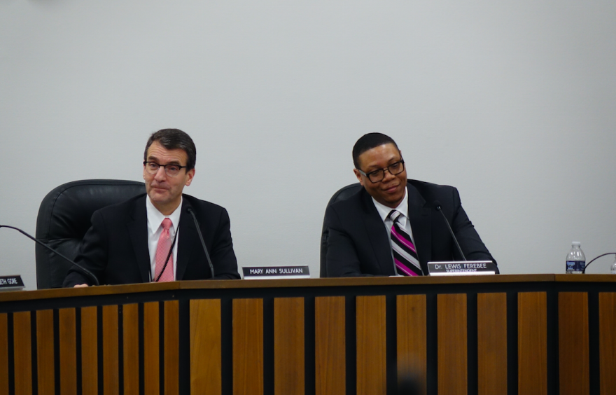 Newly elected IPS Board of Commissioners President Michael O'Connor talks with IPS Superintendent Lewis Ferebee during the board organization meeting Monday, Jan. 8, 2018.