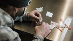 A man uses a safe injection site in New York City in January. A bill in California would allow pilot sites in San Francisco, Oakland and Los Angeles.