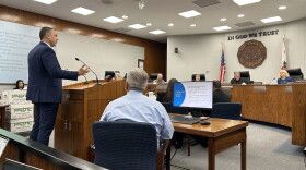 CEMEX executive Nathan Layfield gestures from the podium during Thursday's Fresno County Planning Commission hearing regarding the company's proposed blast mine near the San Joaquin River north of Fresno.