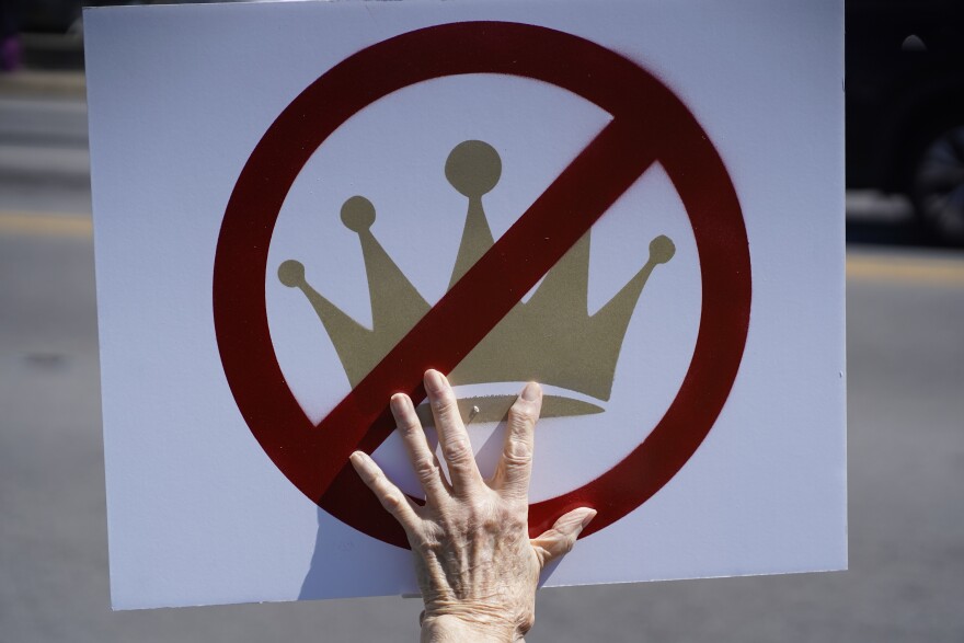 Participants in Greenville joined Saturday’s “No Kings” rally carrying signs protesting the Trump administration.