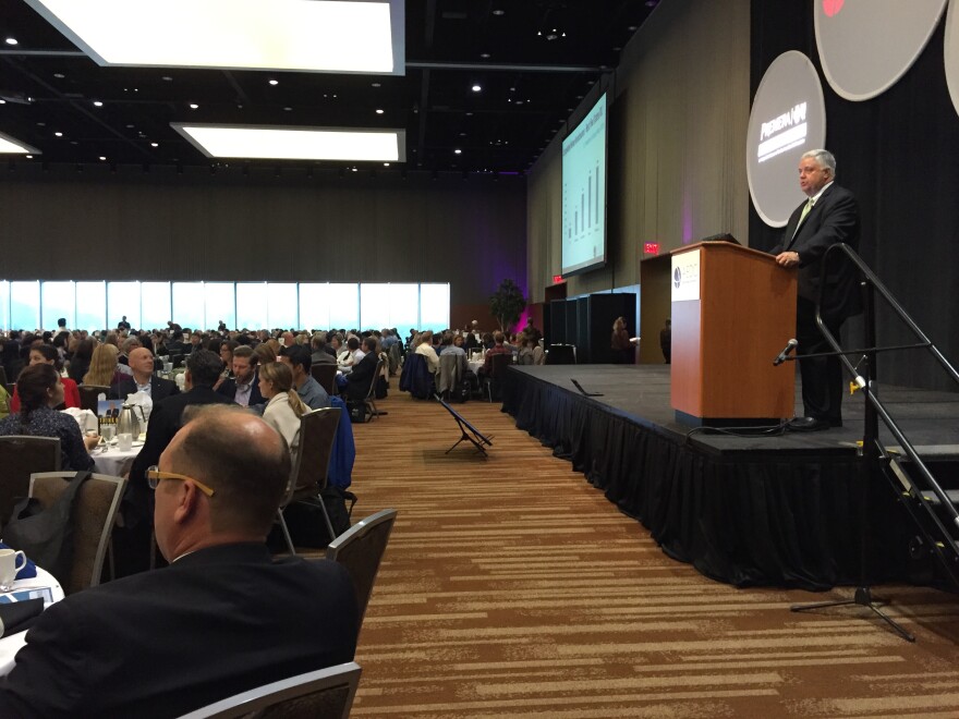 Anchorage Economic Development Corporation CEO Bill Popp addresses the crowd at the group's annual economic forecast luncheon on Wednesday, July 27. (Photo by Graelyn Brashear, Alaska Public Media - Anchorage)