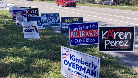 Campaign signs along a highway
