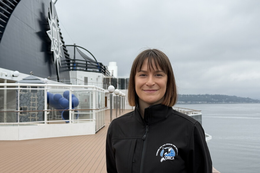 Marine mammal observer Maria Snell with the British charity ORCA poses for a portrait aboard the MSC Poesia on Aug. 10, 2026, in Seattle.