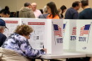 Monroe County residents cast their ballot for the 2024 election at Perinton Square Mall on Friday, November, 1st during early voting.