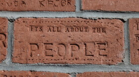 One of many bricks that makes up the new folk art piece at the Old Marshall Jail.