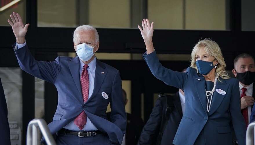 Democratic presidential nominee Joe Biden and his wife Jill Biden depart the Delaware State Building after casting their ballots for the general election on Wednesday in Wilmington.