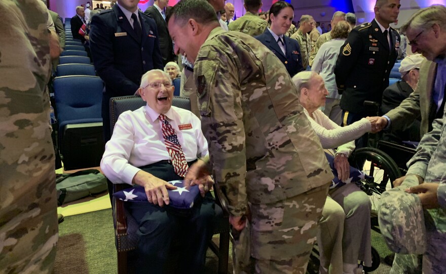 Lt. Bob McClintock of Seminole got emotional after he received a folded American flag from Air Force service members. "I can't explain it,' he said. "It just means a lot to me and I know that so many men and women have died for this emblem.”