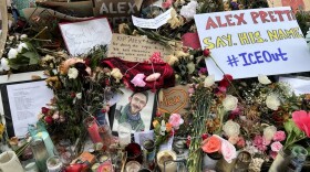 Candles, flowers, signs, artwork, messages and more are gathered in remembrance of Alex Pretti, the 37-year-old Minneapolis man shot and killed by Customs and Border Protection agents, at the site of his death on Nicollet Avenue in south Minneapolis.