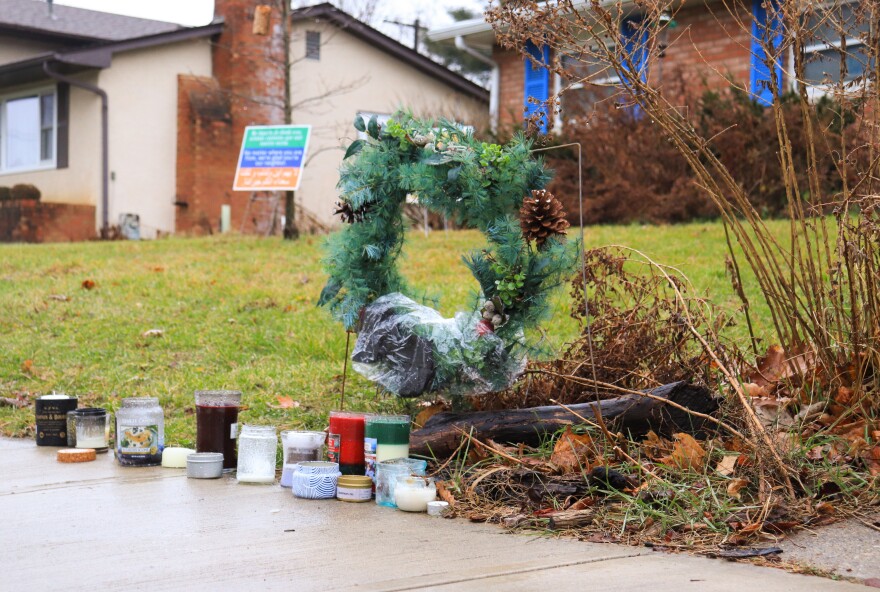 A small memorial has been set up on Oberlin Drive in the yard next door to where Andre Hill was killed. 