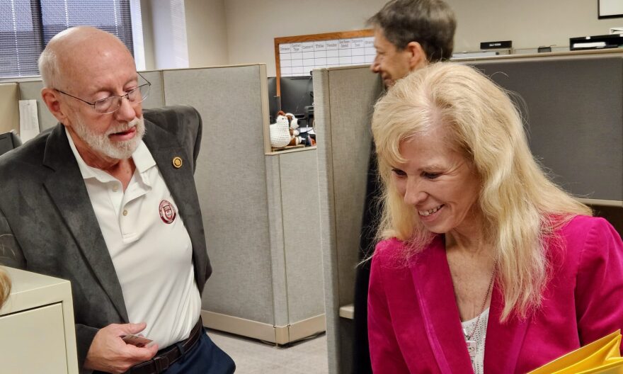 Ellen Nichols, a Republican from Joplin, finishes filing for the 32nd District state Senate seat Tuesday, Feb. 24, 2026, while her husband, former state Sen. Bill White, looks on. Nichols will run against state Sen. Jill Carter, a Republican from Granby who defeated White in a 2022 primary.