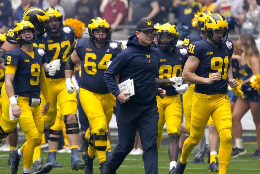 Reports: NCAA likely to suspend Michigan coach Jim Harbaugh