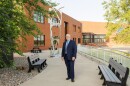 A photo of SIC President Jonah Rice standing on the Harrisburg campus