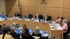 The Wichita school board voted 5-2 Monday to close six schools at the end of this school year.