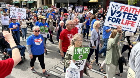 Attendees at the Ohio March for Life walk down High Street in front of the Statehouse on Oct. 6, 2023.