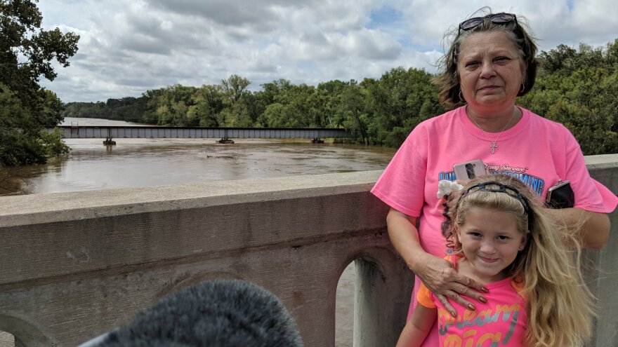 Vicki and her daughter Madison evacuated their home in Tar Heel, NC and have been staying in a Super 8 in Fayetteville. They are seen here, stopping to check out the flooded Cape Fear River, which has recently become a sort of spectator sport.
