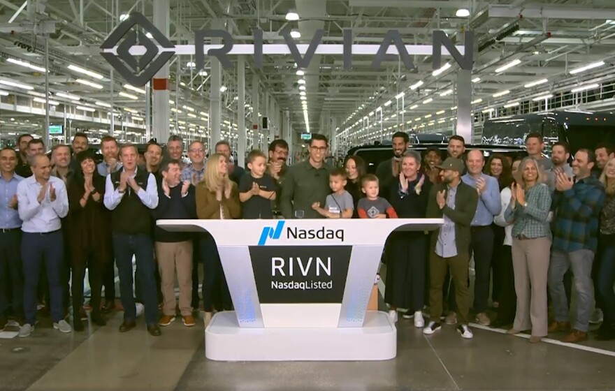 Rivian founder and CEO RJ Scaringe rings the opening bell of the Nasdaq on Wednesday, Nov. 10, 2021, at the Normal manufacturing plant.