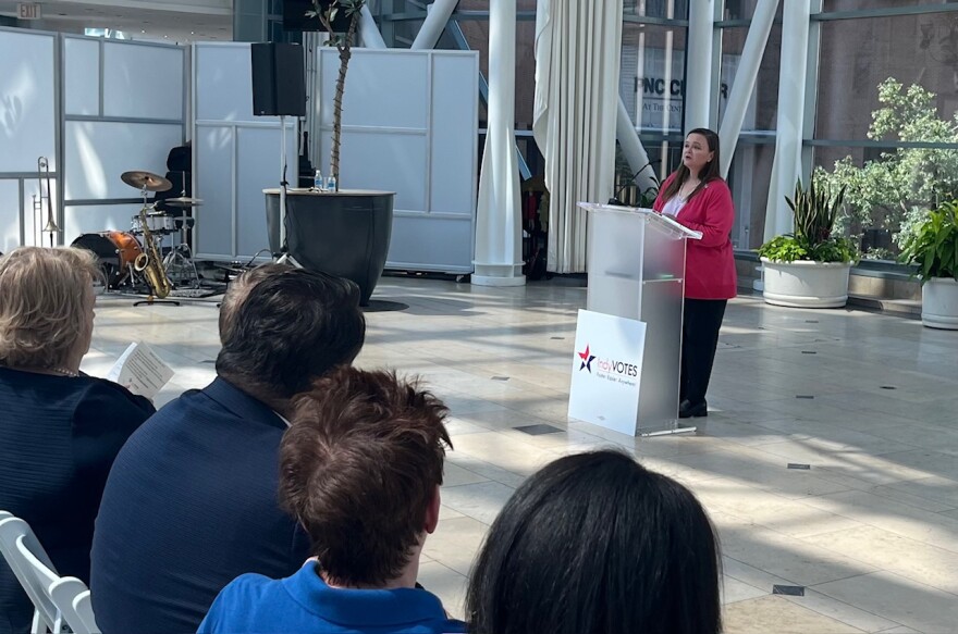 Marion County Clerk Kate Sweeney Bell speaks the voting event at the Indianapolis Artsgarden.