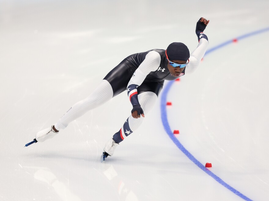 Erin Jackson of Team USA skates to victory to win the gold medal during the women's 500-meter on Feb. 13. She became the first Black woman to medal in speedskating at a Winter Olympics.