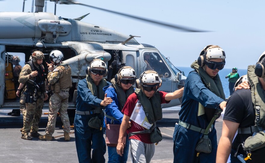 USS Dwight D. Eisenhower Render Assistance to Distressed Mariners.