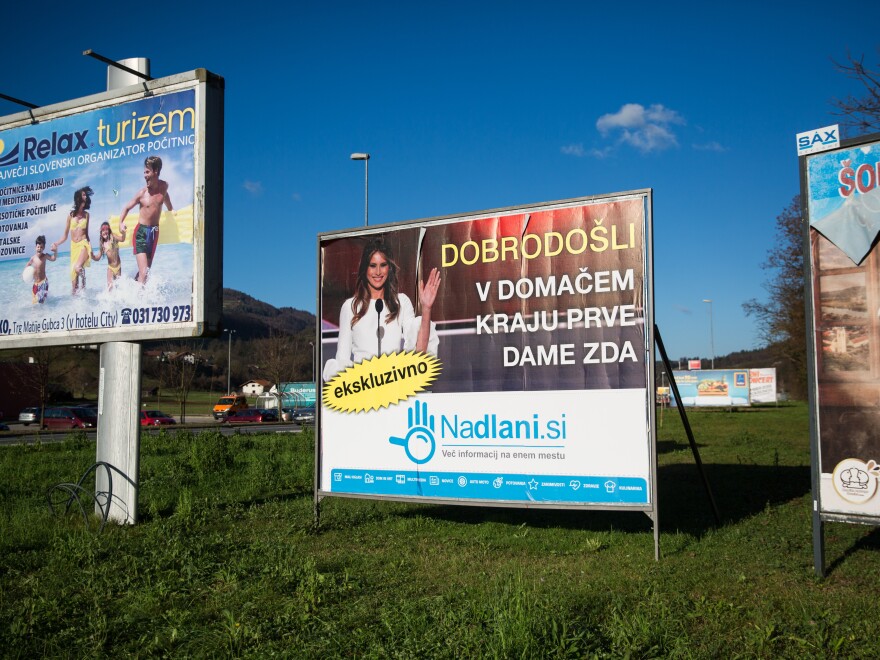 A sign reading "Welcome to the Hometown of the First Lady" in Slovenian is pictured among other billboards in November 2016 in Sevnica, Slovenia, where Melania Trump was raised.