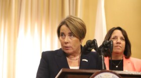 Mass. Gov. Maura Healey talks to reporters the day after Election Day on Nov. 6, 2024. Lt. Gov. Kim Driscoll stands behind her.