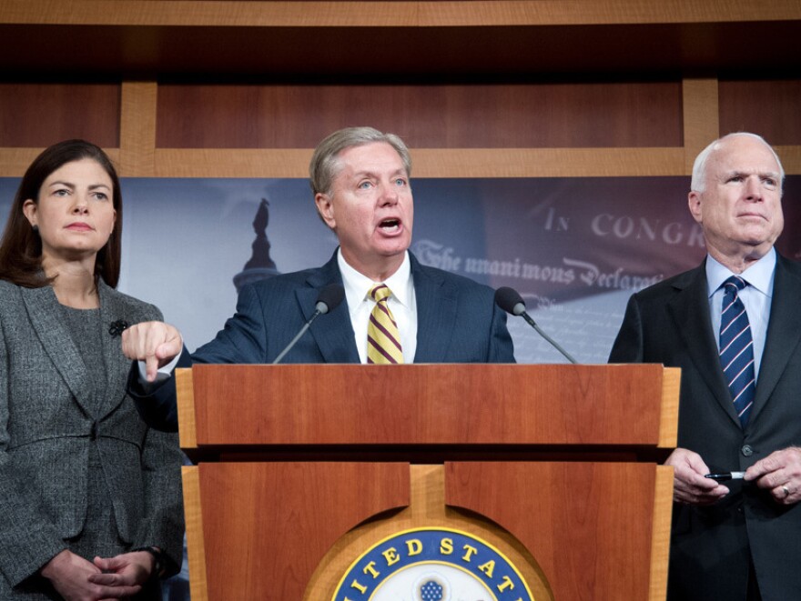 Sens. Kelly Ayotte, R-N.H., Lindsey Graham, R-S.C., and John McCain, R-Ariz., appear during a news conference Wednesday about the terrorist attack in Benghazi, Libya. Graham argued that Rice misled the public when addressing the attack, in which four Americans were killed.