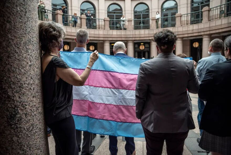  People held up a transgender flag at a protest last year at the Texas Capitol in Austin.