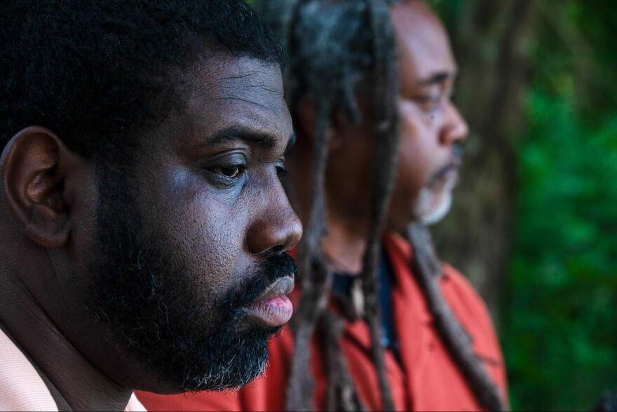 Emmett Till Interpretive Center Education Director Benjamin Saulsberry and National Parks Conservation Association Senior Director of Cultural Resources Alan Spears stand on the banks of the Tallahatchie River — the approximate location of where 14-year-old Emmett Till’s body was found, on Wednesday, July 19, 2023, in Mississippi.