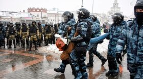 Riot police detain a man during a rally in support of jailed opposition leader Alexei Navalny in Moscow.