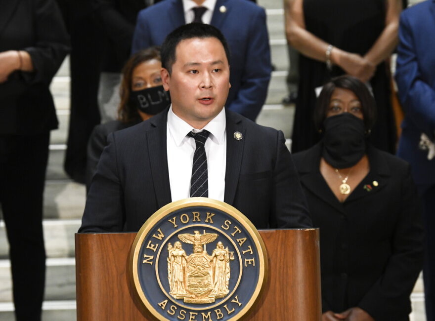 Assemblyman Ron Kim, D-Flushing, speaks in favor of new legislation for police reform during a news briefing at the state Capitol Wednesday, June 8, 2020, in Albany, N.Y. (AP Photo/Hans Pennink)