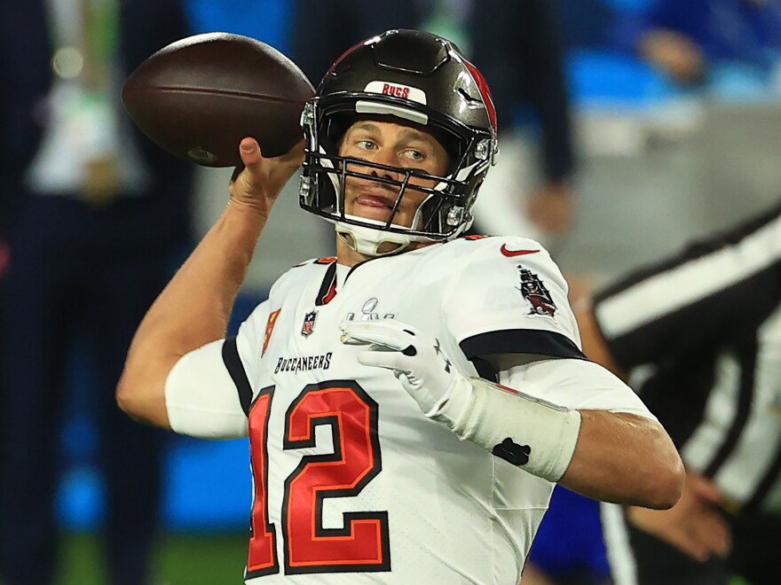 Tampa Bay quarterback Tom Brady tossed three touchdowns in the first half of Super Bowl 55. It was Brady's seventh Super Bowl victory and his first with the Bucs.