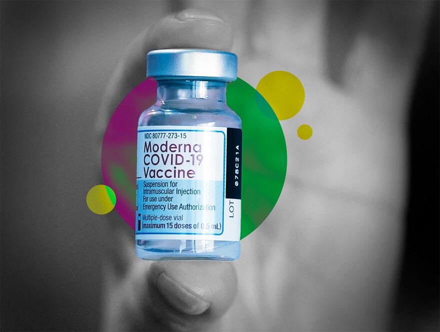 The Moderna COVID-19 Vaccine in someones hands.