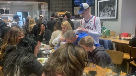 College basketball fans dine at Track 15 in Providence on March 21, 2025.