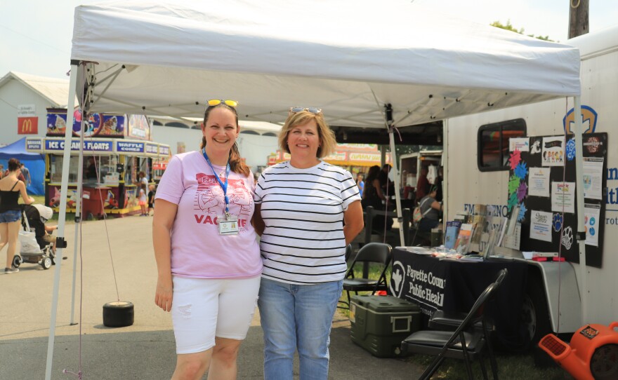 Amy Friel, left, with fellow Fayette County Public Health nurse Kris Wright at the health department's tent.